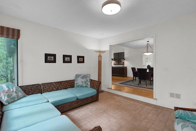 744 Old Oak Trce, Columbus, OH 43235 - living area with healthy amount of natural light and brick patterned flooring