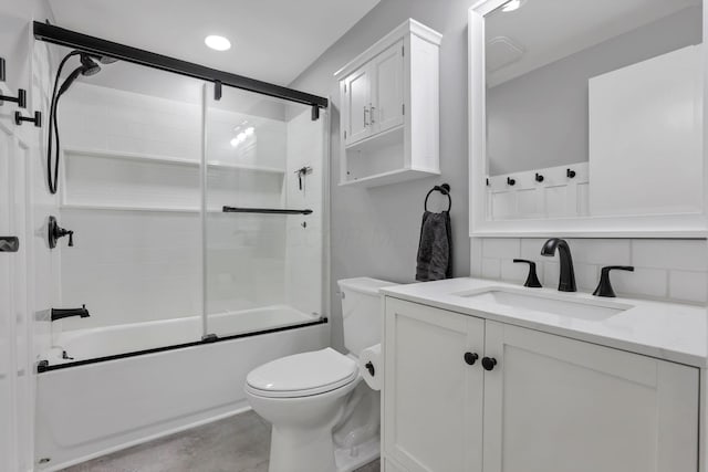 13441 Graham Rd SW, Pataskala, OH 43062 - full bath with vanity, toilet, enclosed tub / shower combo, and tasteful backsplash