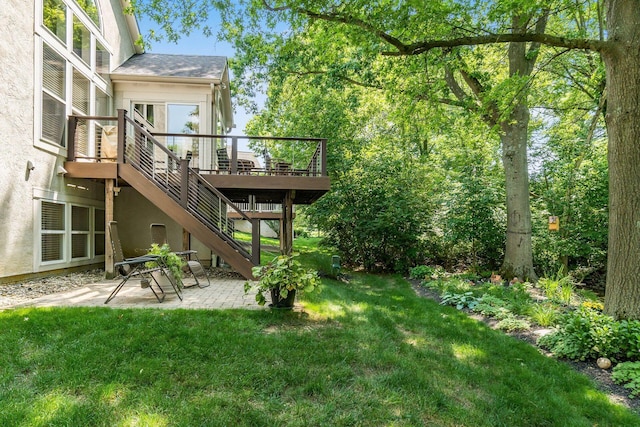 165 Tinley Park Cir, Delaware, OH 43015 - view of green lawn with a patio, a deck, and stairway