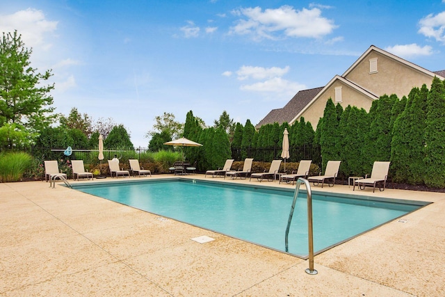 165 Tinley Park Cir, Delaware, OH 43015 - community pool featuring a patio area