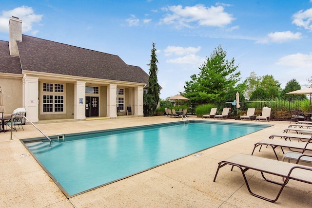 165 Tinley Park Cir, Delaware, OH 43015 - community pool featuring a patio area