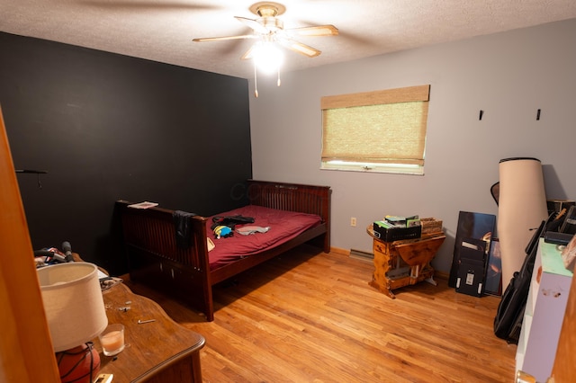9442 Mitchell Dewitt Rd, Plain City, OH 43064 - bedroom featuring light wood finished floors and a ceiling fan