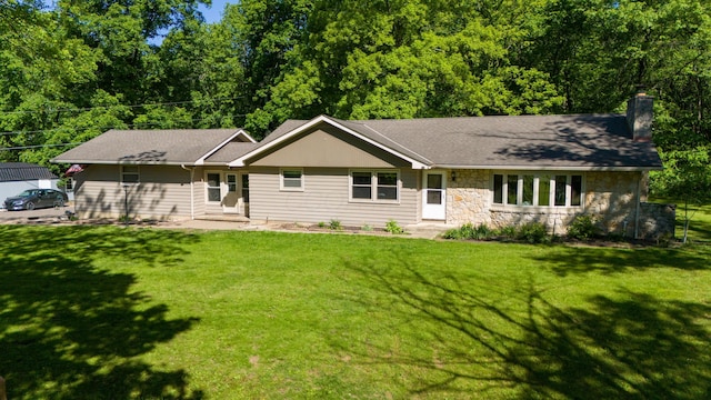 9442 Mitchell Dewitt Rd, Plain City, OH 43064 - single story home featuring a chimney, stone siding, and a front yard