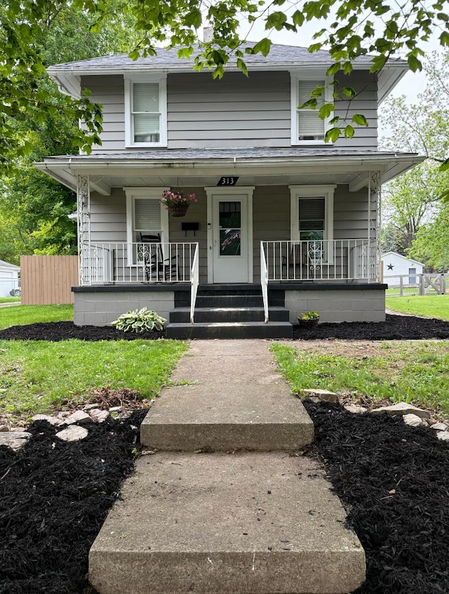 313 E Auburn Ave, Bellefontaine, OH 43311 - traditional style home with a porch