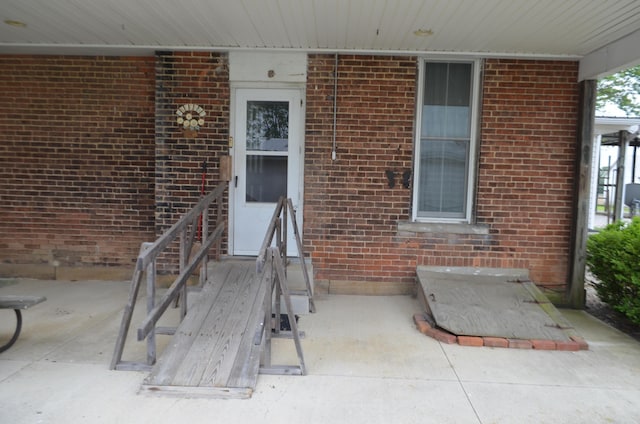 5810 Bickle Church Rd NW, Pickerington, OH 43147 - property entrance with brick siding and a patio area