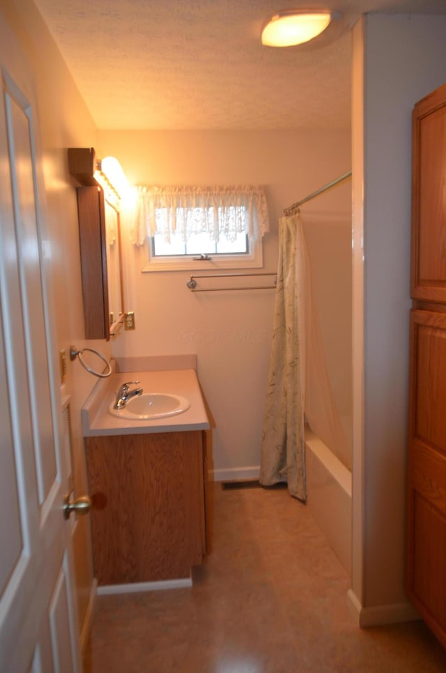 5810 Bickle Church Rd NW, Pickerington, OH 43147 - bathroom featuring vanity and shower / tub combo