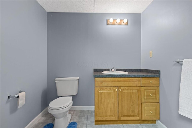 2880 Longridge Way, Grove City, OH 43123 - half bathroom with toilet, vanity, baseboards, and tile patterned flooring