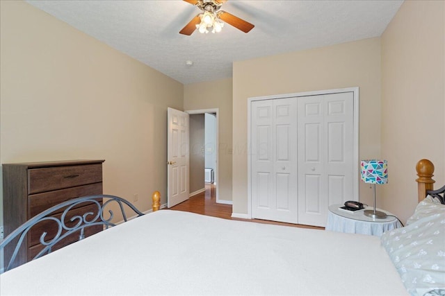2880 Longridge Way, Grove City, OH 43123 - bedroom featuring a closet, wood finished floors, ceiling fan, and baseboards