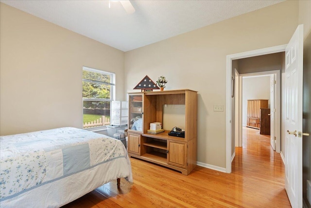 2880 Longridge Way, Grove City, OH 43123 - bedroom with light wood-type flooring, baseboards, and a ceiling fan