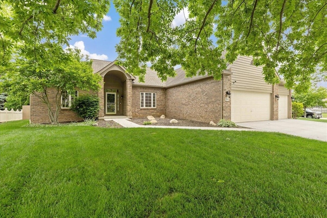 2880 Longridge Way, Grove City, OH 43123 - view of front of property with brick siding, a front lawn, concrete driveway, and a garage