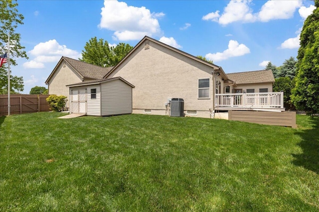 2880 Longridge Way, Grove City, OH 43123 - rear view of house with a deck, stucco siding, and central AC unit