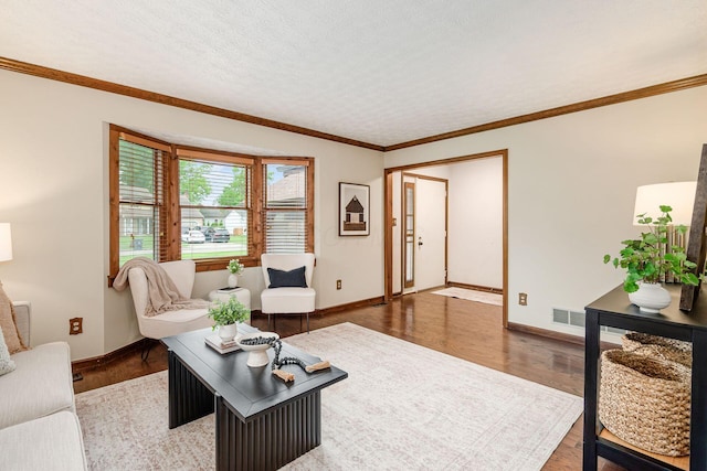 6392 Hilltop Ave, Reynoldsburg, OH 43068 - living room with baseboards, wood finished floors, and ornamental molding