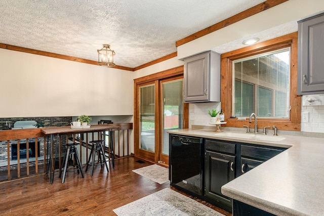 6392 Hilltop Ave, Reynoldsburg, OH 43068 - kitchen featuring dishwasher, a sink, gray cabinetry, a textured ceiling, and light countertops