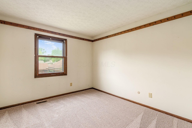 6392 Hilltop Ave, Reynoldsburg, OH 43068 - carpeted empty room featuring baseboards and a textured ceiling