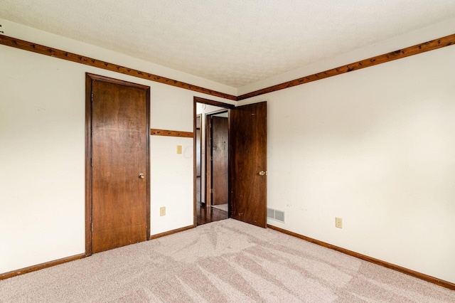 6392 Hilltop Ave, Reynoldsburg, OH 43068 - unfurnished bedroom with baseboards, carpet floors, and a closet