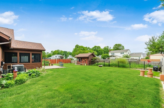 6392 Hilltop Ave, Reynoldsburg, OH 43068 - view of yard featuring a patio, central air condition unit, and a residential view