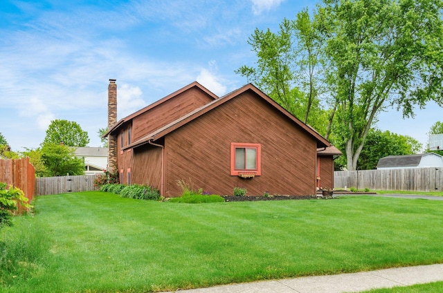 6392 Hilltop Ave, Reynoldsburg, OH 43068 - view of home's exterior featuring a chimney