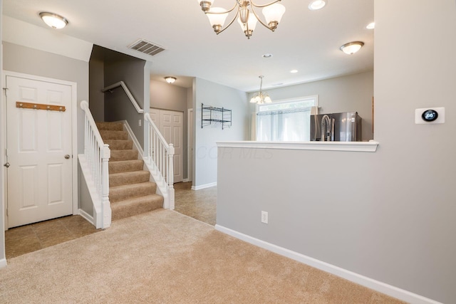 642 Grove Cir Unit 1902, Columbus, OH 43230 - entrance foyer with a chandelier, carpet floors, baseboards, and recessed lighting
