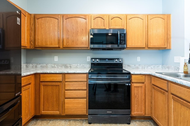 642 Grove Cir Unit 1902, Columbus, OH 43230 - kitchen featuring electric stove and light countertops