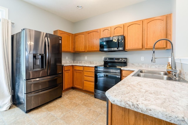 642 Grove Cir Unit 1902, Columbus, OH 43230 - kitchen with appliances with stainless steel finishes, a sink, light countertops, and brown cabinets