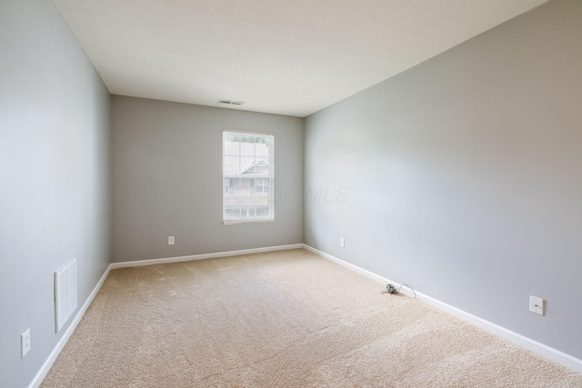 642 Grove Cir Unit 1902, Columbus, OH 43230 - spare room featuring carpet flooring and baseboards