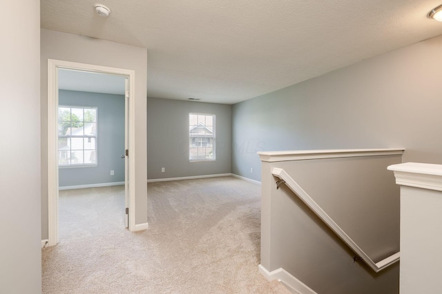 642 Grove Cir Unit 1902, Columbus, OH 43230 - unfurnished room featuring carpet floors, a smoke detector, healthy amount of natural light, and baseboards