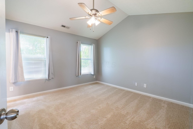 642 Grove Cir Unit 1902, Columbus, OH 43230 - spare room with light carpet, lofted ceiling, a ceiling fan, and baseboards