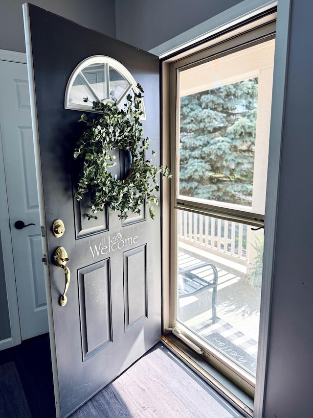 1522 E Quail Run Dr, Newark, OH 43055 - doorway to outside with wood finished floors