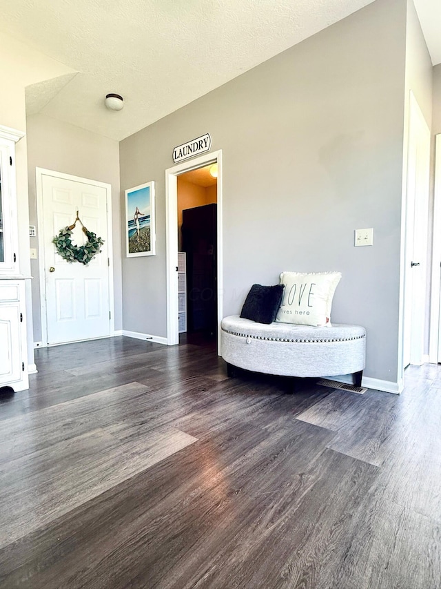 1522 E Quail Run Dr, Newark, OH 43055 - entryway with dark wood-type flooring and baseboards