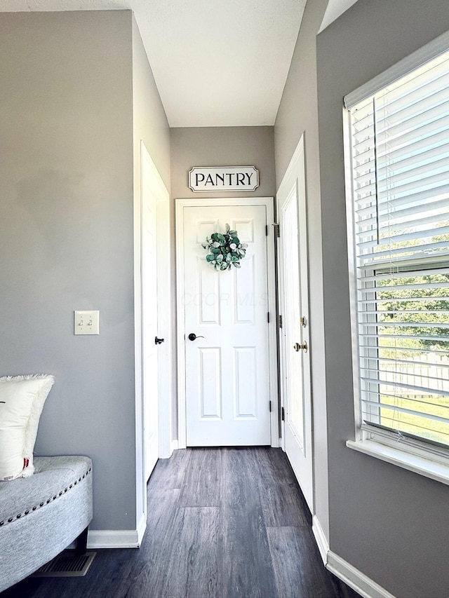 1522 E Quail Run Dr, Newark, OH 43055 - entrance foyer featuring baseboards and dark wood-style flooring