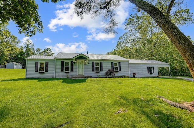 1036 State Route 247, Hillsboro, OH 45133 - view of front facade with a front yard, a metal roof, and a shed