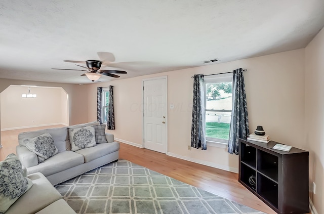 1036 State Route 247, Hillsboro, OH 45133 - living area featuring wood finished floors and ceiling fan