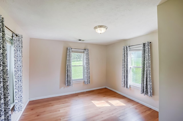 1036 State Route 247, Hillsboro, OH 45133 - empty room featuring light wood finished floors and baseboards