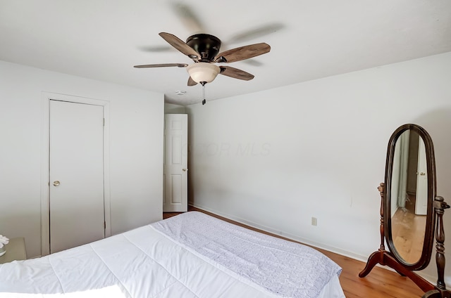 1036 State Route 247, Hillsboro, OH 45133 - bedroom with light wood-style flooring and ceiling fan