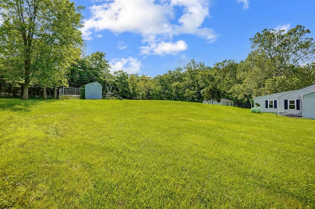 1036 State Route 247, Hillsboro, OH 45133 - view of grassy yard featuring a shed