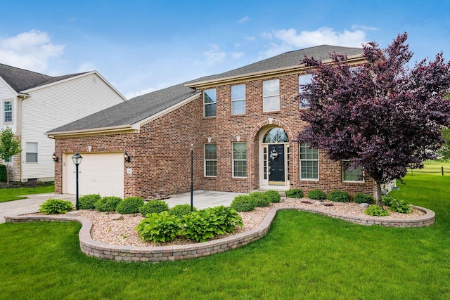 56 Dellenbaugh Loop, Etna, OH 43062 - view of front of home with brick siding, a garage, a front lawn, and concrete driveway