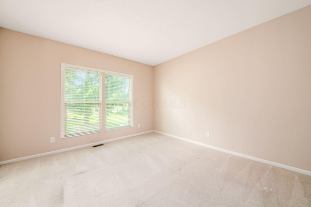 56 Dellenbaugh Loop, Etna, OH 43062 - empty room featuring baseboards and light colored carpet