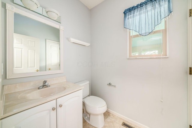 56 Dellenbaugh Loop, Etna, OH 43062 - bathroom featuring toilet, vanity, baseboards, and tile patterned floors