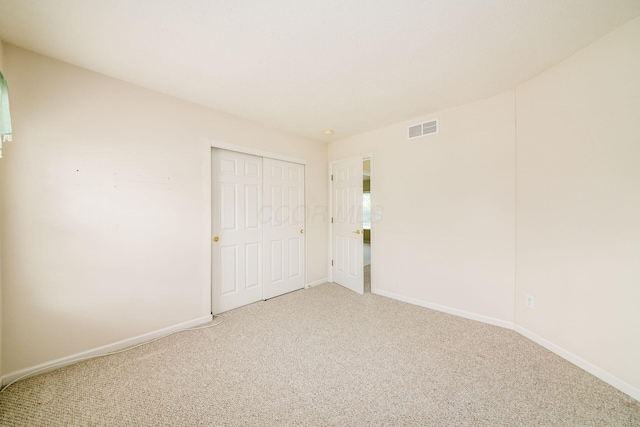 56 Dellenbaugh Loop, Etna, OH 43062 - unfurnished bedroom featuring light colored carpet, baseboards, and a closet