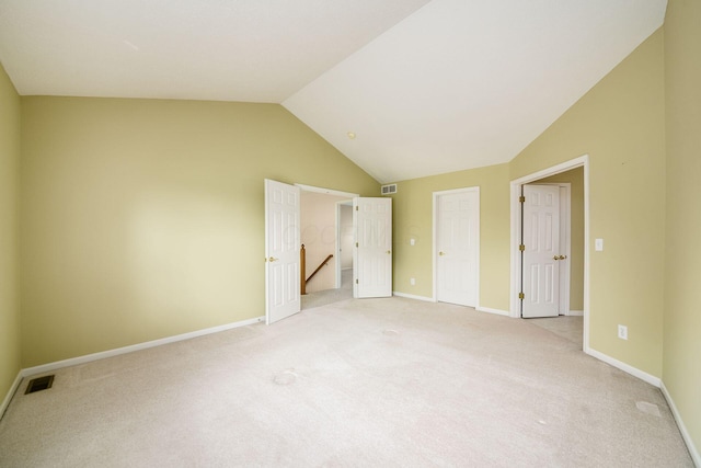 56 Dellenbaugh Loop, Etna, OH 43062 - unfurnished bedroom featuring vaulted ceiling, light colored carpet, and baseboards