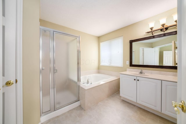 56 Dellenbaugh Loop, Etna, OH 43062 - bathroom with vanity, a shower stall, and a garden tub