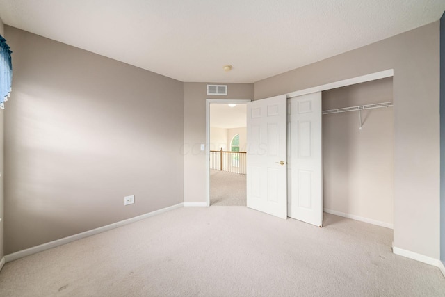 56 Dellenbaugh Loop, Etna, OH 43062 - unfurnished bedroom featuring carpet floors, baseboards, and a closet