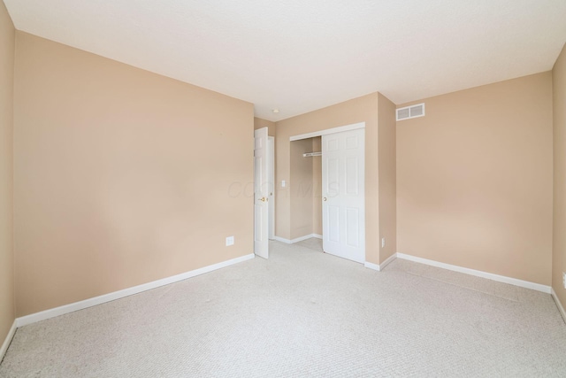 56 Dellenbaugh Loop, Etna, OH 43062 - unfurnished bedroom with light colored carpet, baseboards, and a closet