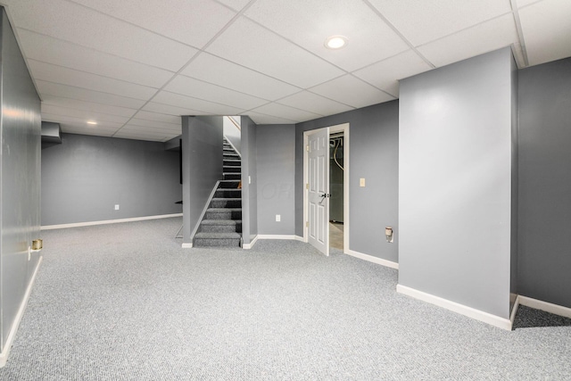 56 Dellenbaugh Loop, Etna, OH 43062 - finished basement featuring stairs, carpet, baseboards, and a paneled ceiling