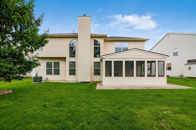 56 Dellenbaugh Loop, Etna, OH 43062 - back of house featuring a chimney, a yard, a sunroom, and cooling unit