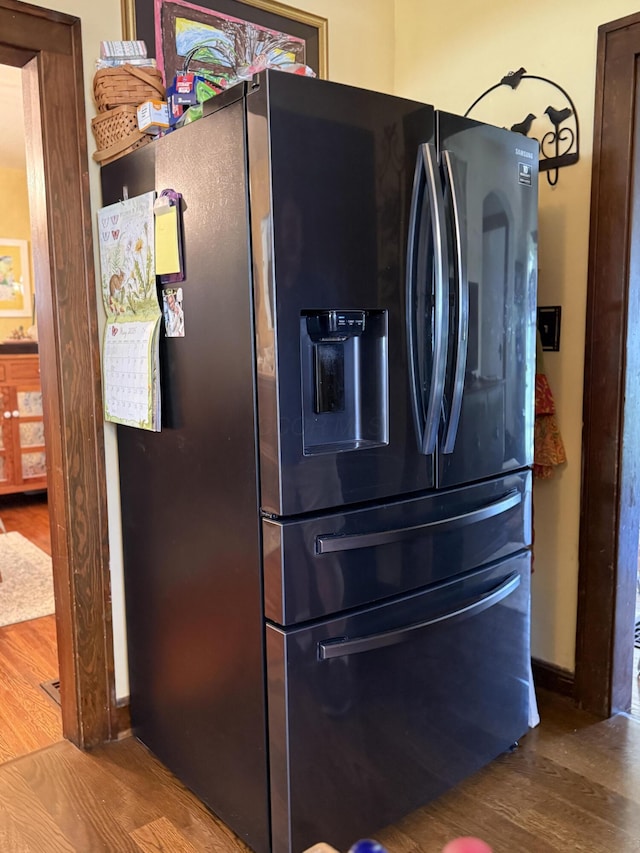 550 E Allen St, Lancaster, OH 43130 - kitchen view of stainless steel fridge with ice dispenser and wood finished floors