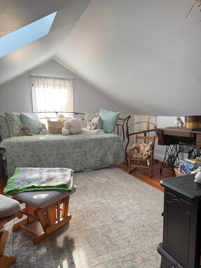 550 E Allen St, Lancaster, OH 43130 - bedroom featuring wood finished floors, vaulted ceiling, and a skylight