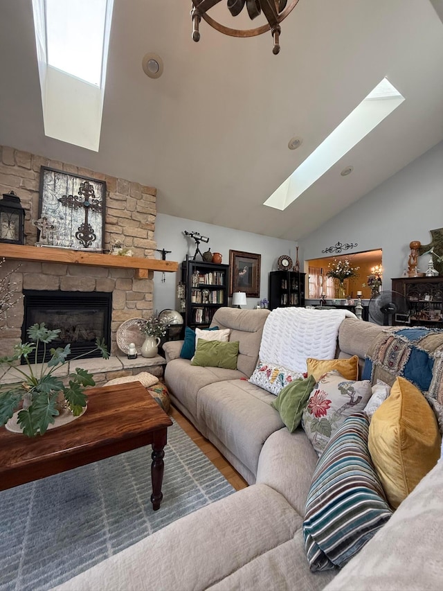 550 E Allen St, Lancaster, OH 43130 - living area with a skylight, lofted ceiling, a fireplace, and wood finished floors