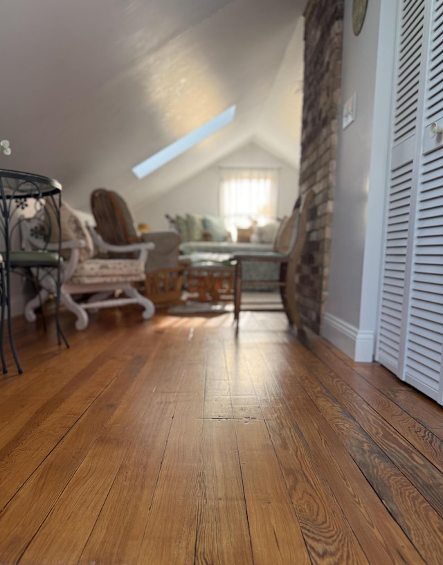 550 E Allen St, Lancaster, OH 43130 - additional living space featuring vaulted ceiling, a skylight, and wood finished floors