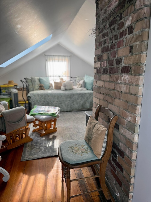 550 E Allen St, Lancaster, OH 43130 - living area featuring hardwood / wood-style flooring, a skylight, and vaulted ceiling